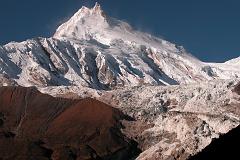 Manaslu 08 03 Manaslu Early Morning From Beyond Sama As I walked towards Samdo, I turned and caught another view of Manaslu with the Manaslu Icefall tumbling down. The normal climbing route is to the right of the glacier, and then up the long ridge going right to left.